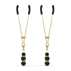 Pinces à mamelons dorées avec des perles noires