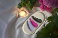 Womanizer Enhance - Duo clitoridien air et vibration - Rose